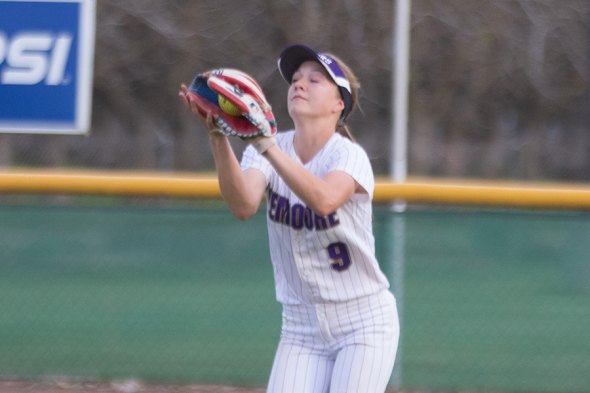 Lemoore's Sierra Phelps closes in on a fly ball in Wednesday's 4-0 loss to El Diamante.